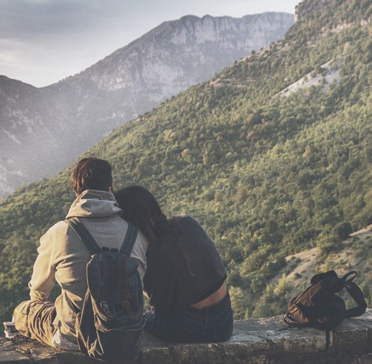 child-free happy couple in the mountains
